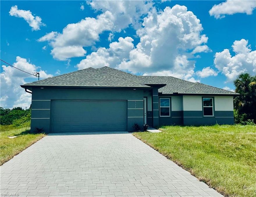 Don't miss this opportunity to own this beautiful home with 3bd, 2ba, 2car garage home! Located close to Palm Beach Blvd/FL 80. This home is in a peaceful but yet quiet space. This home boasts beautiful curb appeal, impact windows and doors, epoxy garage and lanai floors as well as paved driveway, tile throughout, granite counter tops, garage door opener, stainless steel appliances including washer and dryer and much more! You will love this luxurious modern home located close to schools and grocery stores.