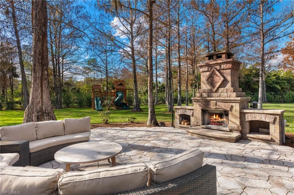 Photo of 5271 Cherry Wood DR, NAPLES, FL 34119 (MLS # 226005856)