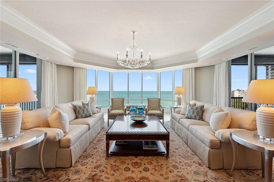 On pristine beach sands of the prestigious, private, gated enclave of Bay Colony. The Windsor epitomizes luxury coastal living. Upon arrival, the private elevator opens to reveal breathtaking, uninterrupted panoramic views. The residence boasts an impressive 6,085 square feet of thoughtfully designed living space, complemented by three generous lanais inviting you to savor spectacular sunrises and sunsets every day of the year. The meticulously crafted floor plan features spectacular reclaimed wood floors throughout the entire residence from an original historic Sears building in Chicago, a luxurious primary suite with dual baths, three guest bedrooms all with en suites, a versatile office with bonus Gulf view, and a chef's kitchen that seamlessly flows into the inviting family room and breakfast nook. The decor and style have been expertly created to be soothing and warm. The Windsor has undergone a complete transformation offering unparalleled amenities designed to elevate every aspect of your lifestyle. These include 24-hour staffed concierge desk, a well-appointed conference room and elegant social lounge, a resort-style pool, a state-of-the-art fitness center and three charming guest villas for your visitors.