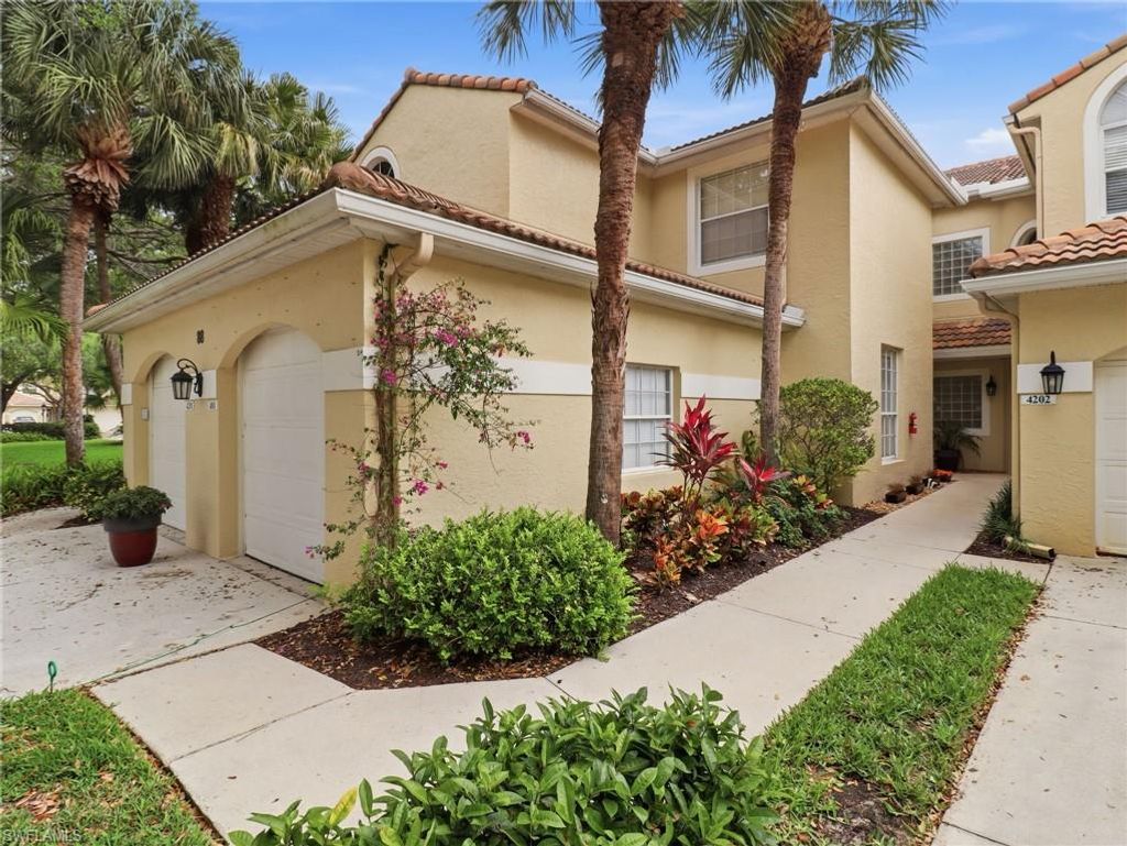 Photo of 88 Silver Oaks CIR #4-101, NAPLES, FL 34119 (MLS # 226012072)