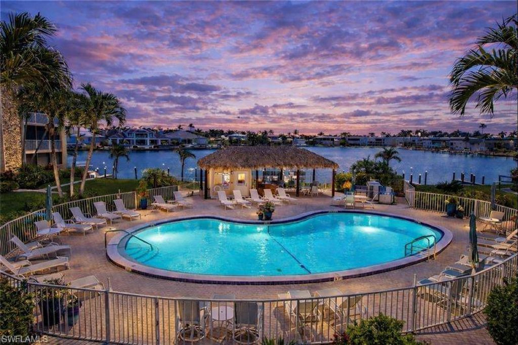 Photo of 3000 Gulf Shore BLVD N #212, NAPLES, FL 34103 (MLS # 225084401)