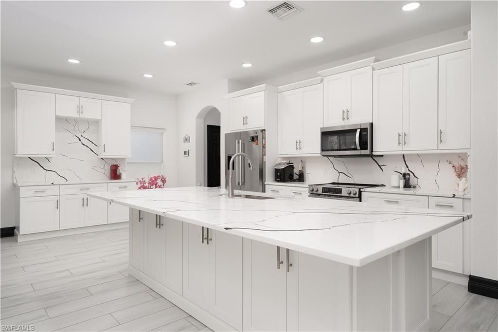 Photo of 8740 Banyan Bay BLVD, FORT MYERS, FL 33908 (MLS # 2025017446)