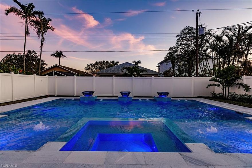 Welcome to this beautifully updated coastal home in the highly desirable Naples Park community, ideally located west of 41 and just minutes from some of Naples’ most popular beaches, shopping, and dining destinations. This fully remodeled, turnkey furnished 4-bedroom, 2-bath property offers a perfect blend of comfort, style, and convenience—ideal for full-time living, a seasonal getaway, or an investment opportunity.
Inside, you’ll find a bright and open floor plan designed for easy everyday living. Plank tile flooring runs throughout the home, offering durability and a clean, modern look. Additional upgrades include wide baseboards, updated lighting, custom closets, and fresh interior paint, creating a move-in-ready space with a cohesive feel.
The kitchen has been thoughtfully renovated with both function and style in mind. It features a waterfall-edge breakfast bar, stainless steel appliances, built-in cabinetry, and a dedicated wine bar with cooler—great for entertaining or casual nights at home.
The primary suite offers a comfortable retreat with a walk-in closet and an updated en-suite bathroom. The additional bedrooms are well-sized and versatile, perfect for guests, a home office, or rental use. Impact-resistant windows and sliding glass doors provide added security and energy efficiency throughout the home.
Step outside to your private backyard, designed for relaxing and enjoying the Florida lifestyle. The saltwater pool includes features like bubblers, water bowls, sun shelves, a sunken spa, and LED lighting. A spacious deck surrounds the pool, offering plenty of room for outdoor seating and gatherings. The outdoor kitchen with built-in grill and prep space makes it easy to entertain year-round.
Recent exterior improvements include a newer roof, updated landscaping with irrigation and sod, a vinyl privacy fence, and a modern garage door that adds to the home’s curb appeal.
With no HOA fees, no rental restrictions, and no flood insurance required, this property offers excellent flexibility and value. Its location in Naples Park puts you just minutes from Vanderbilt Beach, Mercato, and other popular local spots, making it a strong option for both personal use and rental potential.
This is a move-in-ready home that delivers comfort, style, and a great location—ready for you to start enjoying the Naples lifestyle.