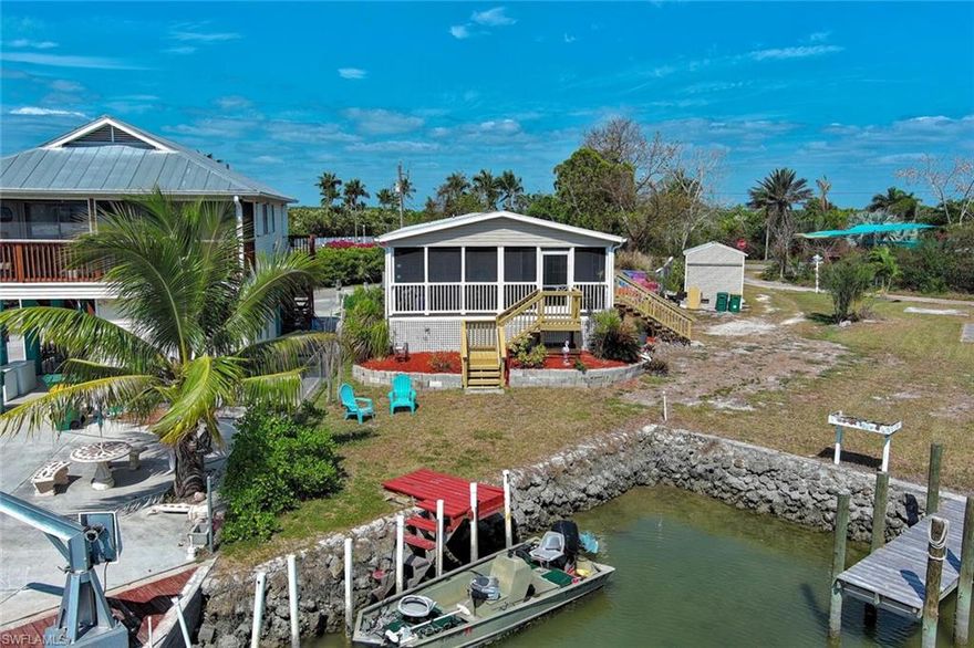 Family/Fisherman’s Paradise in the Heart of the 10,000 Islands! Welcome to this 2016-built, Category 5 rated stilt home, offering peace of mind above flood levels and over 1,000 square feet of living space. Theres no HOA. This 2-bedroom, 2-bath gem sits directly on the water with a dock, direct Gulf access—a dream for any boating or fishing enthusiast. Located on Chokoloskee Island, you’re surrounded by the breathtaking beauty of the Everglades National Park, with three marinas, the Historic Smallwood Store, and a vibrant local restaurant just a short walk away. Whether you’re looking for a full-time residence, a seasonal getaway, or a perfect Airbnb investment, this location offers unbeatable potential. Embrace the laid-back island lifestyle—live, fish, and explore in one of Florida’s last untouched coastal communities. Your next adventure starts here.