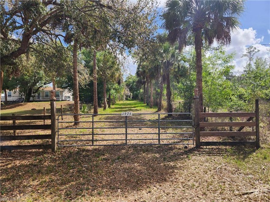 Build your dream home on this beautiful 2.8-acre rural residential property in the Beautiful and historical Ft. Denaud Florida. This property is being offered on the market for the first time in over 30+ years.

Kept as a private retreat, this property surrounded by beautiful fully mature oaks is fully fenced and thoughtfully improved, featuring a small pond the property has drip irrigation throughout and a shale driveway with a convenient roundabout for easy access and parking. Electric is already available on the property, providing a great head start when you're ready to build. Fill is already in place for your future home and garage, helping save time and development costs.

With horses allowed and plenty of open space, this property is perfect for a custom home, small homestead, workshop, or outdoor lifestyle. The land offers flexibility for gardens, animals, recreational vehicles, or additional outbuildings, giving you the freedom to design the country lifestyle you’ve been looking for.

Enjoy the privacy and peaceful surroundings of rural living while still being just minutes from everyday conveniences such as Walmart and Tractor Supply for shopping, supplies, and essentials.

Conveniently located near the fast growing area of LaBelle and only a short drive to Fort Myers, you’ll also have easy access to dining, shopping, entertainment, and Southwest Florida’s beautiful Gulf Coast beaches.