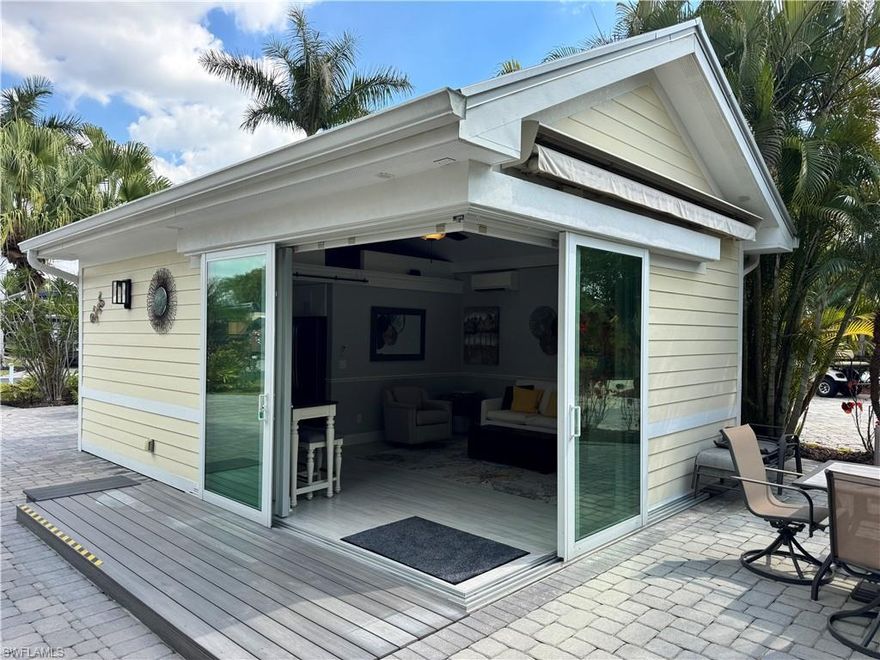 Lot 61 A Tropical Delight with Sunshine, Space & Florida Charm, Step into the wow factor the moment those corner sliding doors glide open and the sunshine pours in. That bright, happy Florida feeling? It’s immediate. This thoughtfully designed coach house welcomes you with airy living space and a corner kitchenette equipped with everything you need to cook up fresh seafood dinners or casual brunches before a day in the sun. The bathroom is spacious, bright, and offers plenty of storage. Climb the charming library ladder to the loft, a cozy retreat for guests or extra storage space. And here’s the best part, it’s completely turnkey. Everything you see stays, making this an effortless move-in decision. Big bonus? The golf cart is included. That means sunset golf cart rides under mossy oaks, cruising down to the river, waving to neighbors, and soaking in those famous painted Florida skies, soft pinks, fiery oranges, and golden reflections dancing across the water. Location is everything, and Lot 61 delivers. You’re just steps from the clubhouse, pickleball courts, and dog park. Plus, this property backs up to a large grassy common area adored by our four-legged residents, giving you a park-like, private feel right in your backyard. It’s secluded, peaceful, and perfect for outdoor entertaining whether you’re hosting friends on the front patio or relaxing on the back lanai. When it’s time to socialize, head down to the River Clubhouse for poolside afternoons at the cabana bar, refreshing dips in the resort-style pool, relaxing hot tubs, live music, themed dinners, trivia nights, bocce, Zumba, line dancing, Texas Hold-Em, and so much more. The lifestyle here is active, welcoming, and full of energy. And just beyond it all flows the peaceful Caloosahatchee River, perfect for scenic walks beneath moss-draped oaks, boat watching, and sunset strolls that remind you why Florida living is truly something special. Lot 61 isn’t just a property, it’s sunshine, palm trees swaying, friendly waves from passing golf carts, painted skies, tropical breezes, and that unmistakable Florida lifestyle wrapped into one irresistible opportunity.