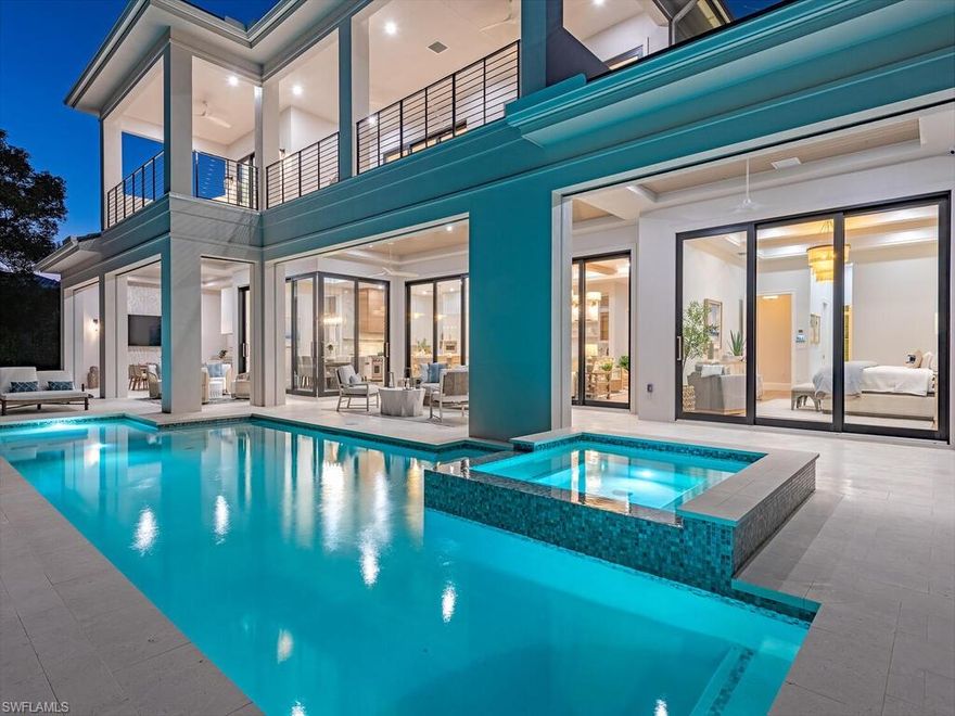 An exceptional achievement in elevated coastal architecture, this newly completed Park Shore residence captures the essence of refined Naples living. Crafted by T.B. Price Builders with architectural vision by T. Boyatt and interiors by R & Co. Designs, this Sand Dollar 2025 winning home reflects architectural distinction with a thoughtful commitment to sustainability. Encompassing approximately 5,135 square feet, the layout features five luxurious en suite bedrooms and a private den, curated to enhance natural light and showcase lush surroundings. European wide-plank flooring, quartzite surfaces, and custom coffered ceilings introduce warmth, timeless craftsmanship, and eco-conscious sourcing. The coveted southern exposure fills the outdoor living areas with all-day light, highlighting the fully appointed summer kitchen and resort-style setting ideal for al fresco sunset gatherings. Inside, a chef-caliber kitchen showcases Sub-Zero, Wolf, and Dacor appliances, seamlessly blending performance with sleek elegance, while impact-rated Andersen windows optimize energy efficiency. Dual first-floor offices, a private elevator, and a versatile upper-level retreat add functionality and flexibility. Energy-efficient systems and environmentally mindful finishes underscore a residence designed for both luxury and longevity, just moments from Venetian Village, Waterside Shops, and Fifth Avenue South.