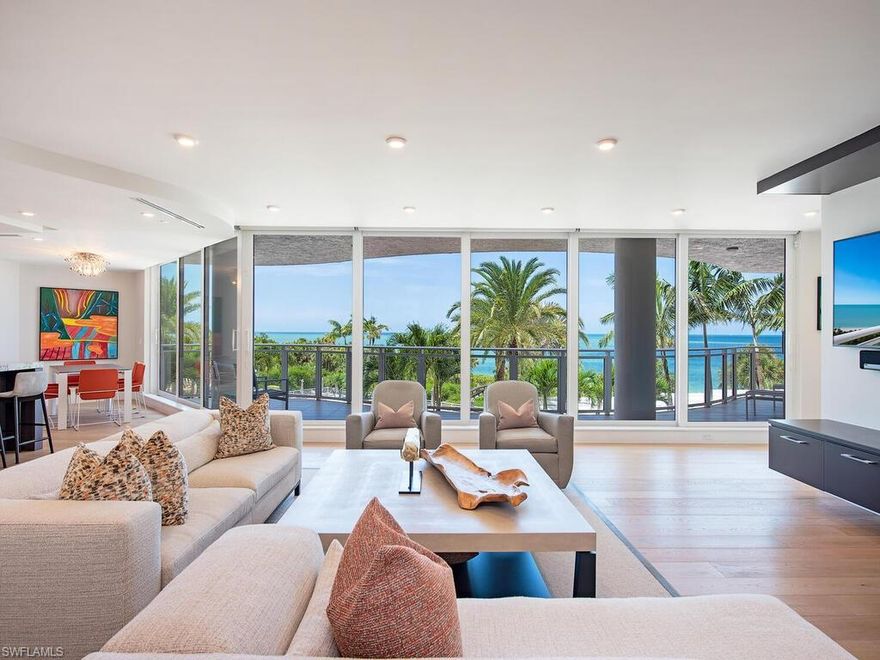 C2707 - Your dream comes true! If you are seeking a designer perfect, exquisitely turnkey furnished, totally Remastered Beachfront JEWEL within Bay Colony ... Naples' most highly prized secure beachfront enclave … look no further! This Blissfully Remastered JEWEL perfectly partners a multitude of custom handcrafted hard surface interior finishes with tastefully superb seaside backgrounds and designer furnishings. This gem, one of the largest properties offered beachside in Bay Colony, touts expansive mesmerizing Gulf views from ALL main living areas, plus your open-air Westerly contemporary glass-railed lanai. This carefully re-designed floor plan magically blends an inviting open, bright and sophisticated design with sleek coastal simplicity. Details include raised ceilings, 3 linear diffused high efficiency A/C systems, 7” solid plank French white oak wire brushed floors, hurricane impact "nano" zero-corner glass sliding door panels and windows, obscure glass and stainless sliding barn door effortlessly privatizing the generous private den/media retreat, custom cabinetry throughout, Wolf / Subzero / Bosch appliances, plus heavenly baths with textured wave Italian tiles and more!