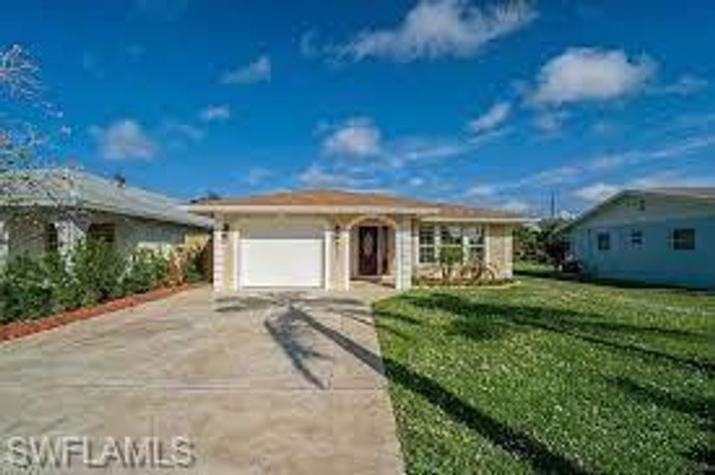 Photo of 637 95th AVE N, NAPLES, FL 34108 (MLS # 226015175)