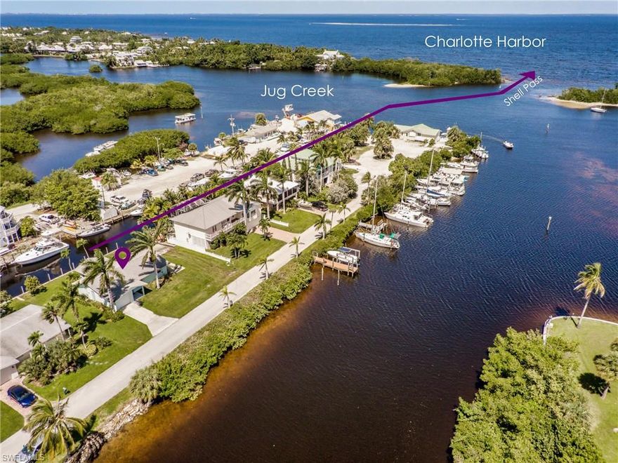 C.17995 - Beautiful Bokeelia! Facing Charlotte Harbor with a collection of quaint homes meshed with several canals competing for attention and adopted its Spanish name, meaning “little mouth”. Don’t miss ISLAND TIME, a waterfront, ground level, double parcel, turn-key bungalow located on Jug Creek with its own private boat ramp on west side of property. A 2 bedroom, PLUS Den, 2 bath home, single-vehicle garage featuring an open floor plan that offers diagonal tile flooring, coastal décor, upgraded bathrooms, and a renovated kitchen with granite countertops, shaker style wood cabinetry, a breakfast bar, double-wide sink offers and more! The exterior boasts the best of the #FloridaLifestyle with ample yard space for an RV, your own boat launch, deep water canal, and enough room for a dock-boat lift, with approval. Hop on the boat, head through Shell Pass and voila, into the open waters Charlotte Harbor or head down Jug Creek and 15minutes to the beaches of Cayo Costa! A boaters paradise!