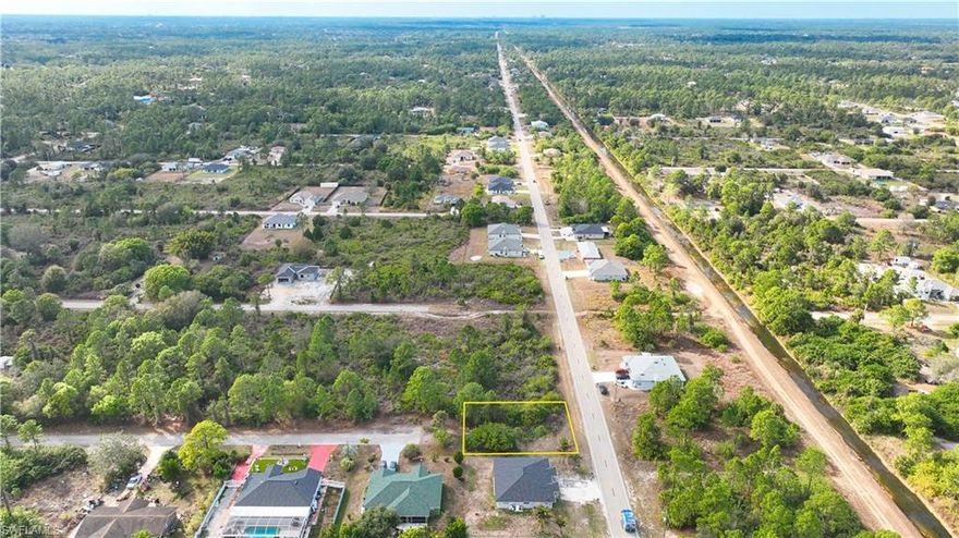 Excellent Investment Opportunity – Canal-Front Duplex Lot in Lehigh Acres! Lowest-Priced Lot in the Area! Don’t miss this prime duplex lot in the heart of Lehigh Acres, offering added privacy and surrounded by newly constructed homes. As the lowest-priced lot in the area, this property presents an exceptional opportunity to build a duplex for rental income or design a custom residence while investing in one of Southwest Florida’s fastest-growing markets. Conveniently located just off Joel Blvd., the lot provides easy access to State Roads 80 and 82 for smooth commuting. Enjoy nearby shopping, dining, parks, and schools—all while tucked into a quiet residential setting. Whether you’re an investor seeking strong returns or a future homeowner ready to build, this property delivers outstanding value and long-term potential.