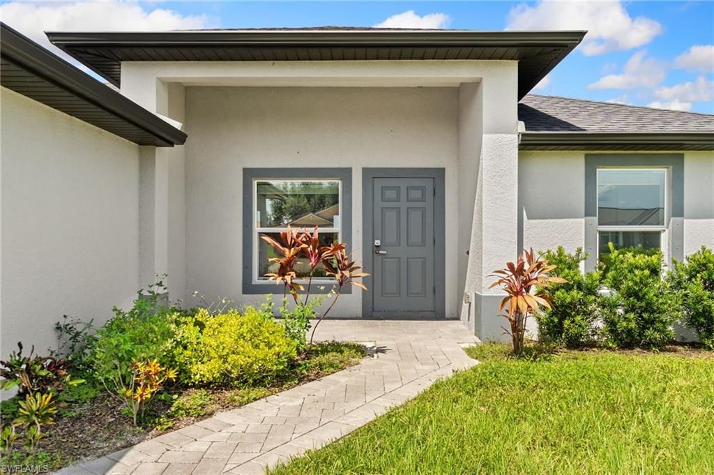 Photo of 2422 NW 21st AVE, CAPE CORAL, FL 33993 (MLS # 226005593)