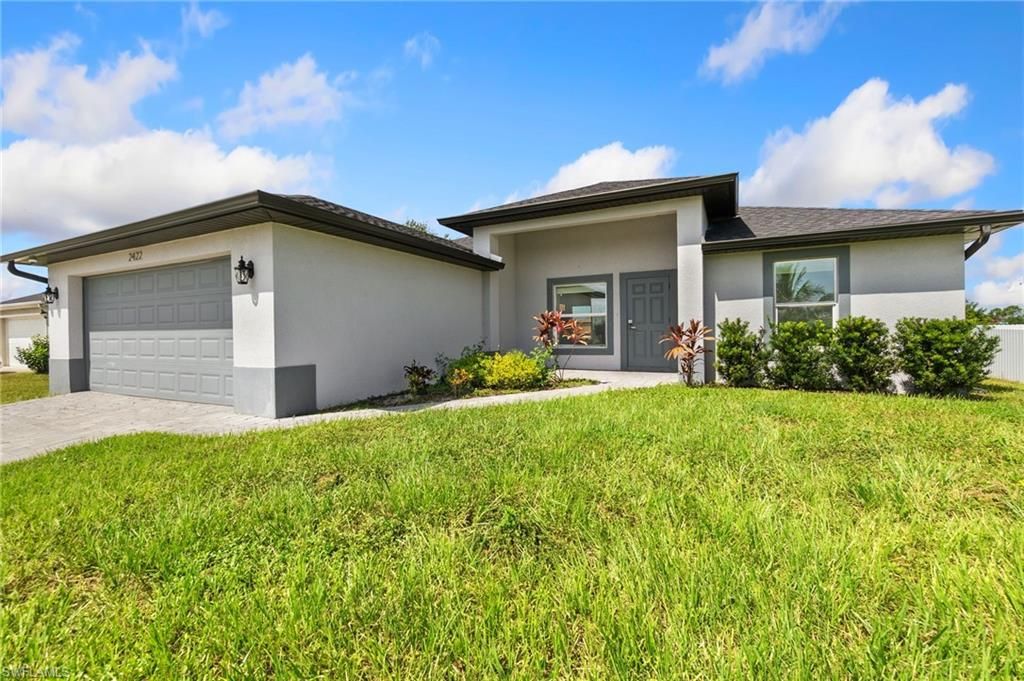 Photo of 2422 NW 21st AVE, CAPE CORAL, FL 33993 (MLS # 226005593)