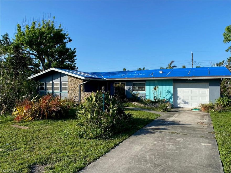 CASH ONLY - This lovely 3 bedroom, 2 bath, 1 car garage, CBS, pool home on a triple lot, located in the wonderful Country Club area. Hurricane Ian flood damaged home. Drywall has been removed 4ft up throughout the house. Large lanai area great for entertaining, large kidney shaped pool and a HUGE triple lot yard! Home is being sold AS IS, not currently livable and anything additional will need to be removed by buyer. Don't miss out on this investment property!