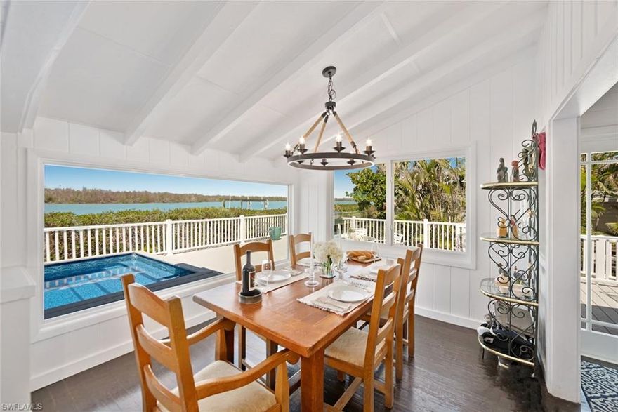 Take a step back in time on the bay at "Coconut Cottage". This meticulously refurbished Hemingway style home is quaint and reminiscent of OldeFlorida and days gone by. Set up as a four bedroom, there is room for the whole family with 2 living spaces along with a large deck in addition to a wrap around dock. Overlooking Sunset bay to the west, this location is home to a myriad of birds, dolphin and manatee alike. If you have been searching for a quintessential island cottage within walking distance to the beach you have arrived. Furnishings are negotiable. Dock will be repaired.