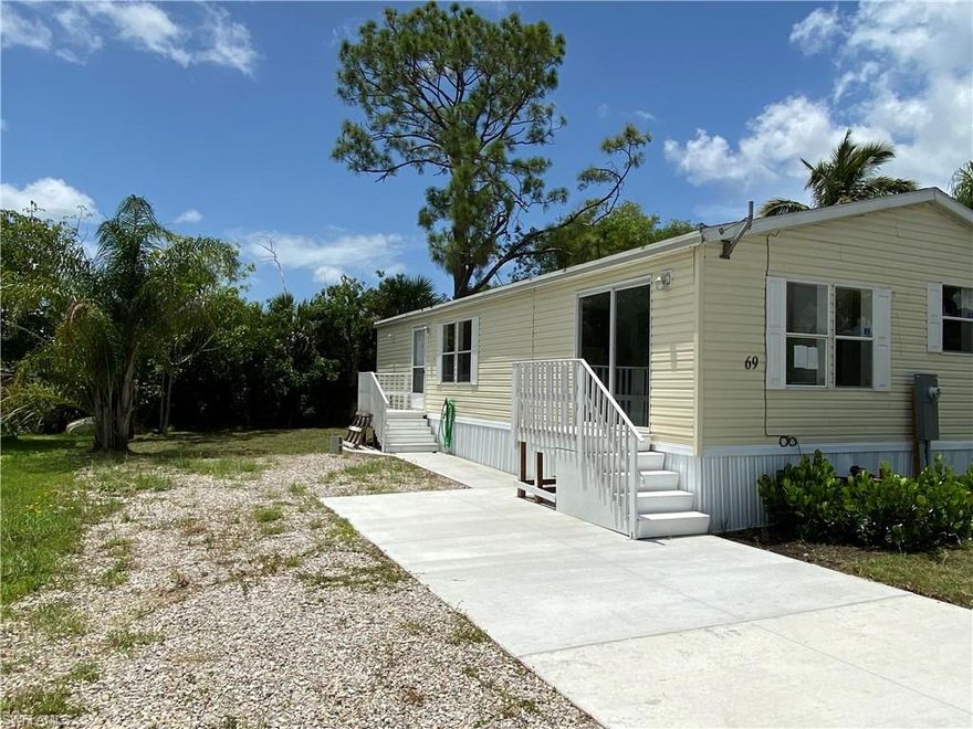 Buyer financing fell through ....Own your own land...NO HOA FEES....This desirable community location is NOT a 55+ community.... Plenty of room for you to park your RV. This lovely home features 3 bedrooms, 2 baths - Single-family manufactured Home is very spacious and has the laundry inside the home, is vacant and ready for a new Homeowner. A/C has been used for just 1 year. This home is seated in a great location on and just minutes away to Marco Island!