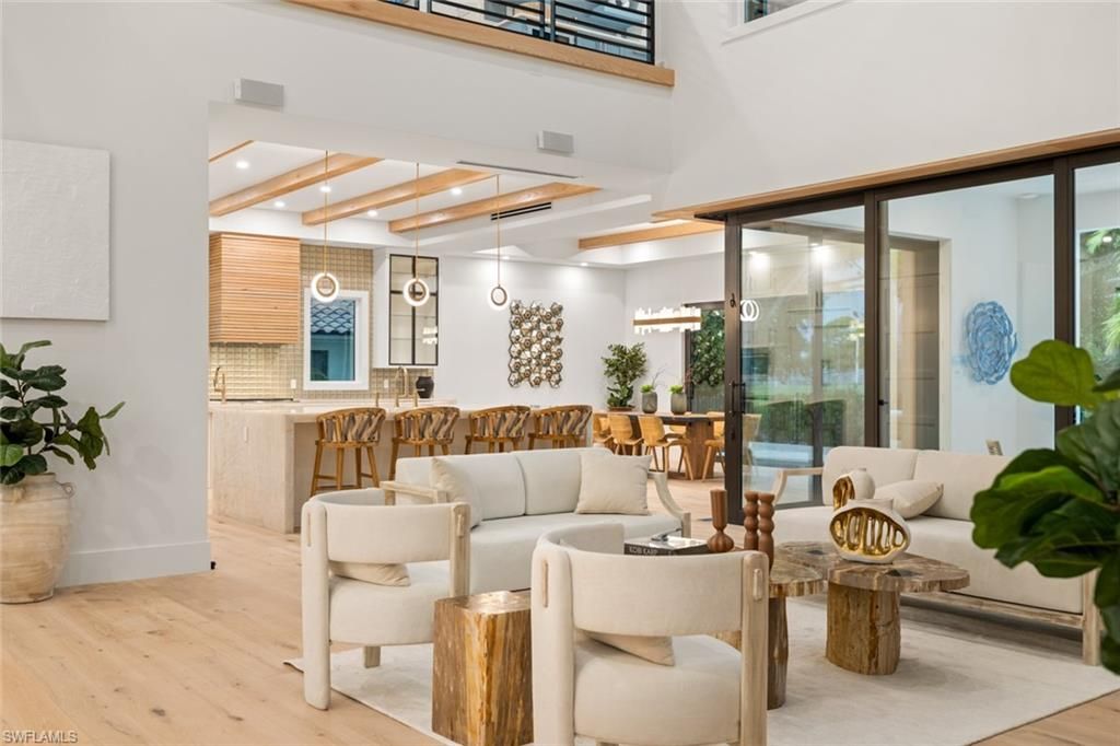 Photo of 565 Whispering Pine LN, NAPLES, FL 34103 (MLS # 225061336)