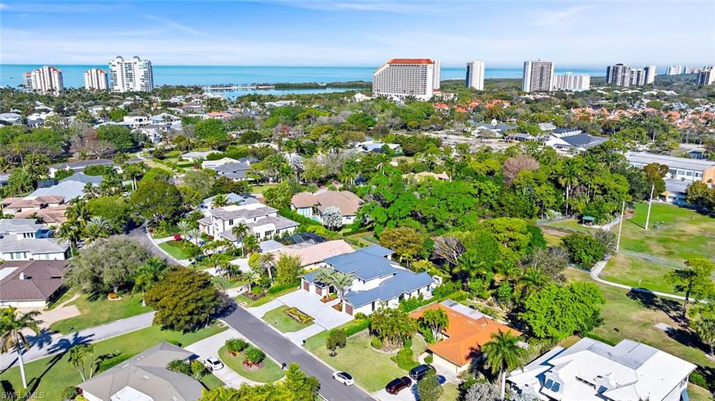 Photo of 565 Whispering Pine LN, NAPLES, FL 34103 (MLS # 225061336)