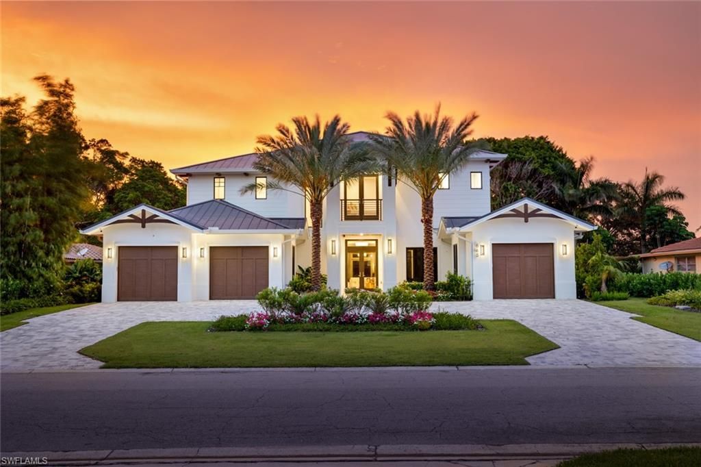 Photo of 565 Whispering Pine LN, NAPLES, FL 34103 (MLS # 225061336)