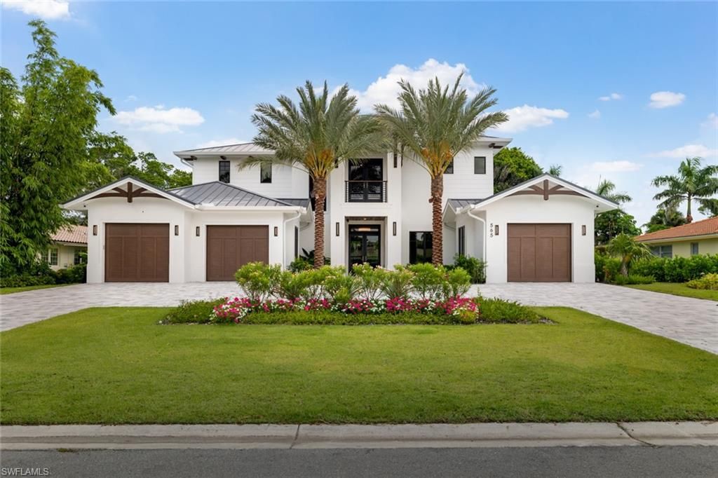 Photo of 565 Whispering Pine LN, NAPLES, FL 34103 (MLS # 225061336)