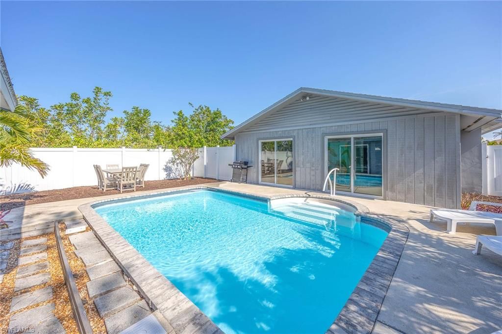 Photo of 668 94th AVE N, NAPLES, FL 34108 (MLS # 226021103)
