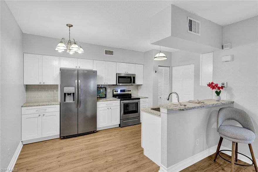 BEST VALUE ONE BEDROOM CONDO ON THE MARKET! LOCATION, LOCATION, BEAUTIFULLY UPDATED, AFFORDABLY PRICED, FIRST FLOOR, PET-FRIENDLY Condo in the Gardens at Bonita Springs, nestled just South of the intersection of West Terry St. and Matheson Ave. This MOVE-IN READY condo has many upgrades including the KITCHEN AND BATHROOM, NEW CEILING FANS, NEW HVAC (AUG 2020), NEW WATER HEATER (JAN 2026), NEW DISHWASHER (JAN 2022), NEW WASHING MACHINE (JULY 2023). Luxury plank vinyl flooring throughout. Very large bedroom with huge WALK-IN CLOSET. Beautiful greenspace and gopher tortoise preserve area. The convenience of first floor with assigned parking right in front of the walkway is a bonus. Plenty of guest parking! Beautifully maintained grounds, this association is professionally managed by some of the best in the area! LOW CONDO FEES at only $224.64/month (a 65 cent increase from last year!) Enjoy the Resort-style pool and Fitness Room plus a shaded area with picnic tables and grills for dining al'fresco! Enjoy Monday nights in the clubhouse for a game of cards from 5pm-8pm. First-time home buyers, Snowbirds and year-round residents love to call the Gardens at Bonita Springs HOME! This condo is also ideal for business travelers who need a convenient crash pad or for FGCU or local college students for a quiet environment to study. A short distance to Downtown Bonita Springs where you will find a BEAUTIFUL PUBLIC LIBRARY, SUGAR SHACK, RIVERSIDE PARK, ROOFTOP AT RIVERSIDE, KAYAKING, BONITA WONDER GARDENS, HISTORICAL SITES & COTTAGES, RESTAURANTS and so much more! You will love the proximity to the "soon-to-open" new MIDTOWN BONITA just a few miles to the East. The Old US 41 coridor is growing in leaps and bounds and has become the new favorite hot spot for holiday events, nightly live music, and recreation with a flare of Olde Florida ambiance. Conveniently location between Naples, with only 8 miles to SEED TO TABLE, and Fort Myers with only 23 miles to REGIONAL SOUTHWEST FLORIDA INTERNATIONAL AIRPORT. Many Gulf of America Beach options to choose from including Naples, Bonita Beach, to Lovers Key, all a short drive away. ***ONE YEAR HOME-TECH HOME WARRANTY INCLUDED WITH PURCHASE!***Quick move-in available! (Preferred X500 Flood Zone. No prior storm damage.)