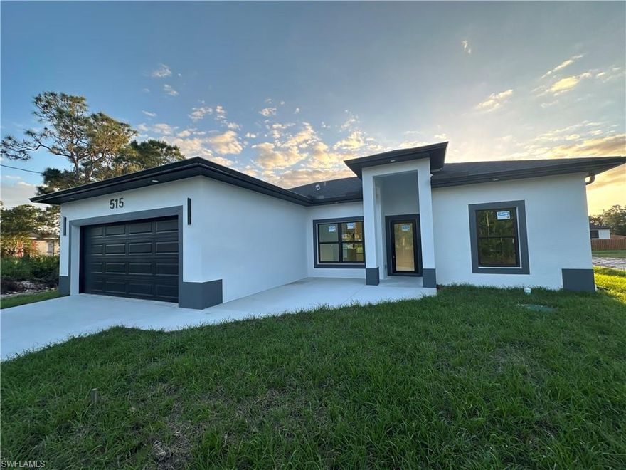 Welcome to this stunning and beautiful new 2026 home on a spacious lot in one of the fastest-growing areas of Lehigh Acres, Florida. This home features 3 bedrooms with ceiling fans , and custom closets. 2 bathrooms with smart mirror.  Enjoy the spacious kitchen with an oversized island that adds a touch of elegance to the modern kitchen with new stainless steel appliances. High ceilings with abundant natural light and a gated lanai for your security. This beautiful property offers a wealth of features, including LED lighting throughout the home. Impact-resistant doors and windows, a 2-car garage with epoxy floor  and a washer and dryer included in the laundry room. The property is now ready.