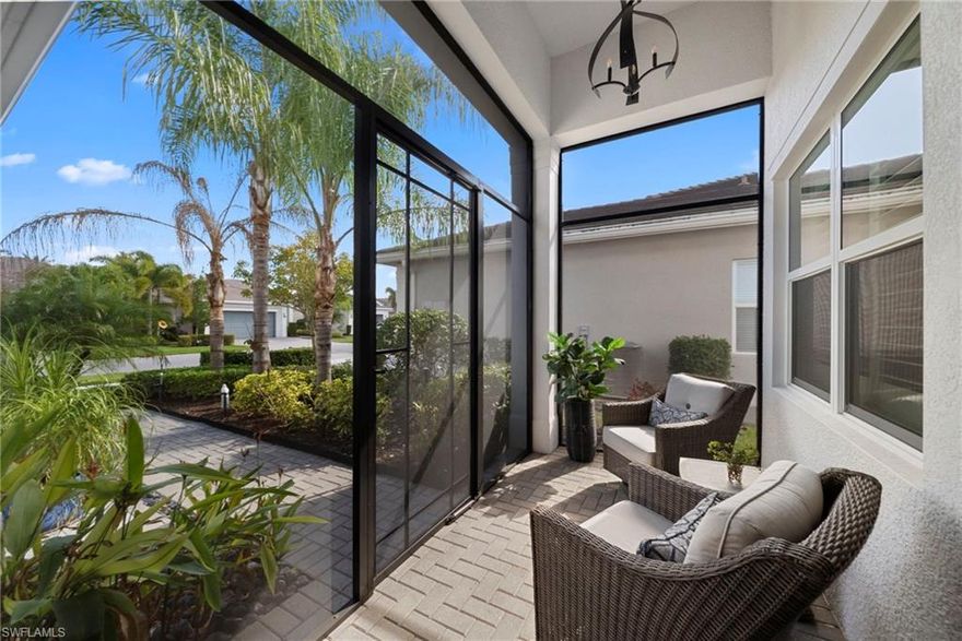 Experience refined Florida living in this exceptional lakefront residence located in the prestigious, gated community of Valencia Bonita. Built in 2021 and thoughtfully designed with the sought-after Tribeca floor plan by GL Homes, this custom single-family home captures stunning water views and unforgettable sunset skies through its picture-window screened lanai and expansive outdoor living space.

Inside, you’ll find a bright, open-concept design highlighted by soaring ceilings, abundant natural light, and sophisticated accent lighting that creates a warm yet elegant atmosphere. The living area flows seamlessly to the covered lanai, making this home ideal for both entertaining and everyday enjoyment.

The chef-inspired kitchen is beautifully appointed with premium upgraded appliances, quartz countertops, pull-out cabinetry, and generous bar seating. A versatile formal dining room offers flexibility as either an elegant dining space or a welcoming gathering area.

This home features 3 bedrooms, 2.5 baths, plus a den/office. The owner’s suite is a private retreat with tranquil lake views and a spa-style bathroom complete with dual vanities, a dedicated makeup area, and two custom walk-in closets.

Notable upgrades include a Wi-Fi-enabled whole-house generator, impact-rated windows and doors, Wi-Fi-controlled electric hurricane screens for the lanai, and an insulated Wi-Fi-enabled garage door with granite epoxy flooring and overhead storage. The outdoor living area is enhanced by a professional 10’ summer kitchen with sink, wine cooler, high-end grill, and granite countertops—all overlooking the serene lake through a panoramic picture screen enclosure.

Additional features include a tankless water heater, whole-house water filtration system, alarm system, and natural gas. The home is located in a no-flood zone and carries no CDD fees, offering both peace of mind and long-term value.

Valencia Bonita is renowned for its vibrant, resort-style lifestyle and exceptional amenities. The impressive 45,000-square-foot clubhouse includes a restaurant and bar, social hall, spa and nail salon, fitness center, billiards and card rooms, pottery and cooking studios, and four pools with cabanas and a hot tub. Outdoor recreation abounds with eight tennis courts, eight pickleball courts, and two bocce courts, along with a pro shop, dog park, and a full calendar of social clubs led by a full-time lifestyle director.

Ideally situated near the beaches of Naples, Bonita Springs, and Fort Myers Beach, as well as shopping, dining, arts, and the international airport, this home offers the perfect blend of luxury, convenience, and active 55+ resort-style living.