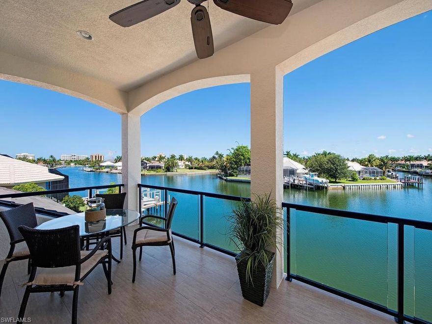 H.12840 - Converging waterway views from this fabulous 4000 sq ft home. Custom built cabinetry throughout, quartz counters, luxurious master bath w/rain shower, custom master closet, hardwood flooring in main living area, second floor has 3 bedrooms, 2 baths & family room, a large balcony w/custom mahogany doors offering gorgeous water and sunset views! Customized ceilings featured throughout the home.