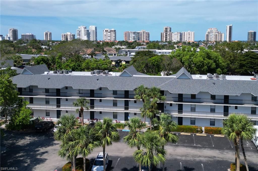 Photo of 600 Neapolitan WAY #345, NAPLES, FL 34103 (MLS # 225043609)