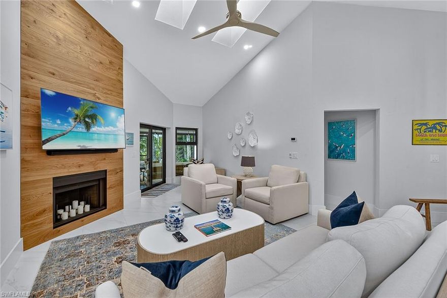 In the lush enclave of Eagle Creek Golf and Country Club, this exquisitely renovated villa redefines contemporary golf course living. Every element of this furnished three-bedroom, two-bath residence has been elevated with an emphasis on comfort, craftsmanship and connection to nature. New impact-resistant windows and doors frame the tranquil golf course and preserve views, bringing the outdoors in with a sense of calm sophistication. Inside, soaring vaulted ceilings with architectural skylights and two screened atriums flood the open layout with natural light, illuminating refined details such as imported Italian tile, updated interior doors and moldings, custom window coverings, and luxurious furnishings. At the heart of the home, the beautiful kitchen blends form and function. Striking quartz countertops with a waterfall island anchor the space, complemented by premium appliances and thoughtful design that invites daily living and effortless entertaining. In addition to the incredible living spaces, one will also find spacious and well-appointed bedrooms, two luxury baths, custom closet-built-ins and convenience of a one-and-a-half-car garage. Just a short distance away, the newly renovated clubhouse offers championship golf, refined dining and a vibrant social atmosphere. For those seeking leisure and wellness, the nearby Crystal Lake clubhouse presents outdoor dining, poolside relaxation, a fitness facility, pickleball, tennis and more. This one-of-a-kind residence invites you to experience the art of living beautifully in one of Southwest Florida’s intimate golf communities. Membership required.