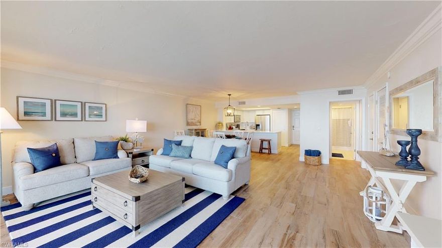 Welcome to your calm coastal retreat—offered TURNKEY and ready for immediate enjoyment! Whether you’re searching for a serene personal escape or a high-demand income-producing rental opportunity, this beautifully appointed residence delivers the perfect blend of comfort, style, and flexibility. This 7th-floor, 2-bedroom, 2-bath beachfront high-rise condominium offers a seamless balance of serenity and sophistication. Gentle Gulf breezes, soothing waves, and sweeping horizon views of Sanibel Island and the Intracoastal Waterway create a breathtaking backdrop and a true escape from the everyday. Inside, the light-filled kitchen showcases crisp white cabinetry and stainless steel appliances, opening effortlessly into a spacious living and dining area. A full wall of sliding glass doors frames the spectacular views while flooding the space with natural light. Tile flooring enhances the main living areas, while plush carpet adds comfort to the bedrooms. Both bathrooms have been tastefully updated with modern finishes. The generous primary suite offers private lanai access, and the ensuite bath features dual sinks and an oversized walk-in glass-enclosed shower. Located in the highly sought-after Sanibel Harbour Towers, residents enjoy resort-style amenities including a stunning waterfront pool and private beach access. Just steps away, the Sanibel Harbour Marriott Resort & Spa offers multiple dining and bar options. Owners also have the opportunity to join the Marriott membership program for access to the luxurious spa and fitness center, tennis courts, and indoor pool. This is beachfront living at its finest—don’t miss your opportunity to own a slice of paradise!