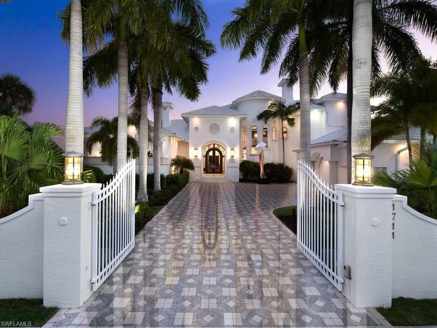This spectacular waterfront home features 6686 sq ft, 4 bedrooms, 5.2 baths, office, theater and loft plus family room in dramatic Art Deco flair.  It is located in the prestigious estate area of Marco Island and situated on 1.18 acres on Fredrick Bay with 139 ft of direct access waterfront and captivating views of the Bay out to Caxambas Pass. Very quick out to the Gulf of Mexico for boating enthusiasts.   This unique property offers a stunning tropical garden with paver pathways, fountain and a charming Gazebo and is framed with beautiful lighting and lush landscaping.  Adding to the grandeur of this exceptional residence are three fireplaces, wet bar, elevator, vanishing edge pool, spa, summer kitchen, covered lanai and multiple balconies. Most of the exquisite art and furnishings and an incredible outdoor Kinetic Art Sculpture are all inclusive with the purchase of this magnificent estate.