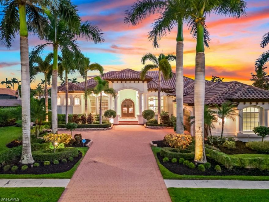 Indulge in the epitome of luxury living as you enter the meticulously manicured tropical landscaping and royal palm tree lined paver driveway into this recently renovated 4 bed+den, 5 bath estate in the prestigious Estates of Marco Island w/ 125' of waterfront, quick direct access to the Gulf & 10,000 Islands, a 3-car garage, and Southern rear exposure for year-round sunshine & warmth.  Relax in one of the lounging areas on the panoramic-screened oversized tile-decked lanai or in the sparkling pool w/waterfall spa & fountains. Inside, an open-concept chef's kitchen flows into the entertainment room (w/disappearing corner sliders), great room, & wet bar, creating a perfect entertaining space. Luxury abounds w/tall ceilings & sliders, impact glass, tray & coffered ceilings, crown molding, fine decorator-selected furniture, décor, and finishes, and custom window coverings, throughout. A newer composite wood dock (2017) features a boat lift, 2 jet ski lifts, & a tanning area to fulfill your boating & sunning dreams. Just 1 mi from the pristine white sand beaches, shopping, & entertainment, this property defines coastal luxury living. Your waterfront dream awaits in paradise!