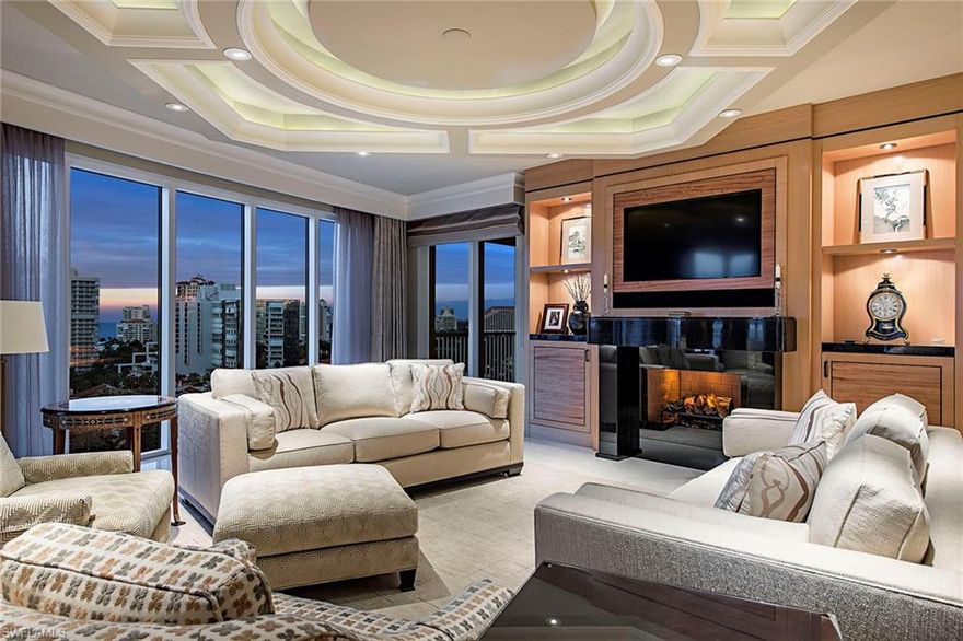 This 14th-floor Aria residence meets the highest standards of luxury beachfront living. Numerous upgrades and extraordinary attention to detail by Collins & Dupont are evident throughout this exquisitely modified gem. Lutron lighting throughout the residence provides custom lighting options to suit individual needs. Some of the many lavish finishes include marble floors and inlays, architecturally designed ceilings, exotic wood custom-cabinetry by Baker, wet bar with Sub-Zero 46-bottle wine storage, top-of-the-line Wolf, Sub-Zero and Asko appliances in the kitchen, and master bath glass mosaics surrounding a curved built-in seating area. A private two-car garage will thrill the car enthusiast. All of this complements the gorgeous sweeping views of the Gulf, Bay, and city. Aria, one of the finest beachfront buildings in Park Shore, offers an array of luxury amenities and is pet-friendly.