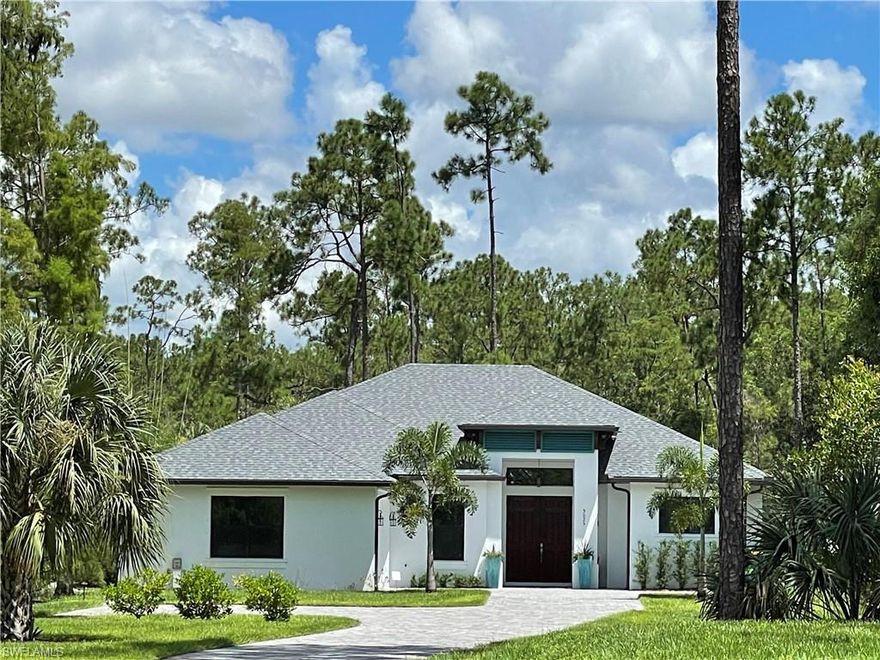 Almost new 4 bedroom, 3 full bathroom home in beautiful Logan Woods including guest suite with separate entrance and full kitchen. This home was completed in 2019 by Kaye Lifestyle Homes in a modern coastal design and a very comfortable floor plan. Tiles in all living rooms, bedrooms and wet areas, dual vanities in Master Bath with freestanding tub and separate shower. One of the bedrooms may be used as a spacious home office for professionals running their business from home. The backyard is fenced and the lawn is easy to maintain. All walk- and driveways are paved and surrounded by a tropical landscape setting. No rental restrictions in Logan Woods.