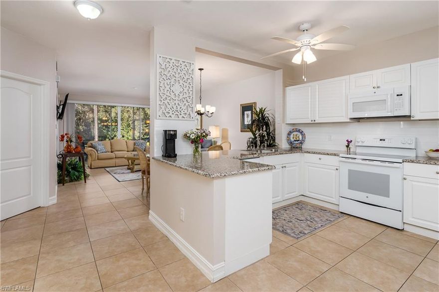 Fresh, light and bright! This 2 bedroom, 2 bath condo is tucked away in the most quiet corner of the community directly across from one of the neighborhood pools. The space has been tastefully updated with granite countertops, white cabinets and tile floors throughout. The primary bedroom is located at the back of the unit offering peaceful landscaped views from the windows and giving your guests privacy on the other side of the condo. A dedicated laundry-room in-unit gives additional storage space. And the screened-in lanai is the perfect place to enjoy your morning cup of coffee while reading a book or watching the birds, with no other buildings in site! Sapphire Lakes is a gated community with multiple community pools, tennis courts, bocce and endless sidewalks meandering through the community. This location gives you close proximity to everything Naples has to offer!