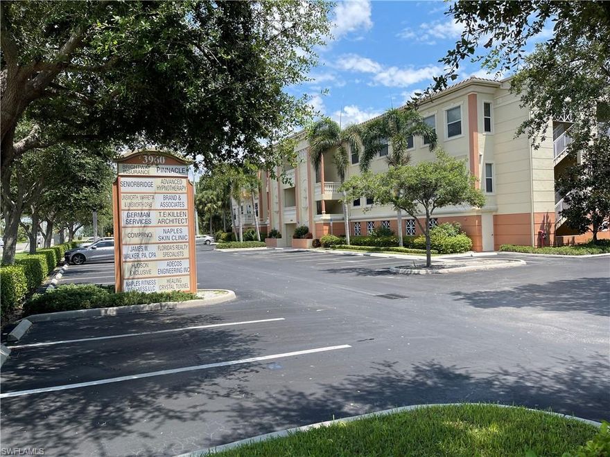 Professional second-floor office suite available for lease in a well-maintained Naples building. The unit is in excellent condition and includes quality office furniture that can remain for tenant use. Large windows provide a pleasant view of the lake and surrounding preserve area. The entire building is sprinkered which should help a tenant's insurance cost.

The layout includes a large reception area, three private offices, and a conference or training room with kitchette (refrigrerator and diswasher)—ideal for efficient business operations. Restrooms are located in common area near the elevator entrance on each floor for convenient access. One assigned covered parking space is included, with additional open parking available at the front and side of the building.

A supplemental floor plan is available showing approximate usable square footage; tenants should verify all dimensions.

This space is well suited for a small professional office such as an attorney, accountant, consultant, or real estate firm.

Leasable square footage is 1184 sf according to Condominium documents.  Useable sf is 992 sf according to the Collier County Appraiser's website.  Landlord is seeking a five year lease. CAM is estimated at $10.00 psf (Condo fees $ 7817.52, Real Estate taxes  $2293.00, and Insurance $ 1,719.00 = $11,829.52 annually or $985.80 monthly).  Total Monthly Rent is Base Rent $2170.67 + CAM $985.80 = $3156.47 per month.