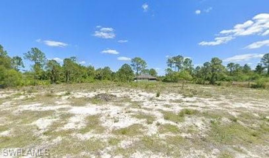 Build your dream home on this beautiful 1-acre homesite in a peaceful Lehigh Acres setting. This spacious lot offers the perfect blend of privacy and natural charm, with a fresh water canal along the property providing a serene water view and added buffer from neighbors. It is located at the end of the block, so no through traffic, and there are utilities in place.  Additionally, the parcel has already been cleared, saving you time and expense—it's ready for your vision to come to life.

Enjoy plenty of room for a custom home, pool, gardens, or even a workshop, all while being conveniently close to local amenities, schools, and main roadways. Whether you're looking to build now or invest for the future, this property is a fantastic opportunity to own a sizable piece of Florida land in a growing area.