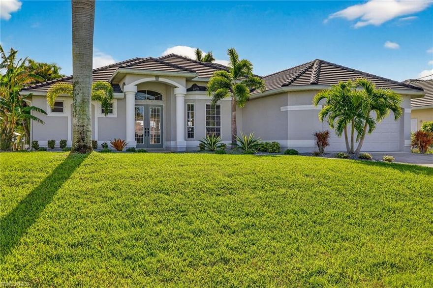Experience the best of Southwest Florida living in this beautifully maintained 3-bedroom, 2-bath, 2-car garage waterfront home with a heated Spa and Pool, perfectly positioned on an extra wide canal in one of Cape Coral’s most desirable neighborhoods. Boasting sought-after eastern exposure, this property delivers breathtaking sunrise views over intersecting canals—creating a truly serene and picturesque backdrop from your expansive lanai.
Designed for both relaxation and entertaining, the outdoor space features a heated pool and spa, a new panoramic screen enclosure, and newly installed pavers that lead to the water’s edge. Lush, updated landscaping enhances the home's curb appeal and tropical ambiance, while recent upgrades including a NEW tile roof, new master bathroom, Air conditioning within the last 2 years, New hot water heater, washer & Dyer within the last year,  and fresh paint throughout provide peace of mind and style that everyone loves. 
Inside you will find an open layout with that perfect view outside right when you walk in the front door. The layout is perfect for entertaining! The master bath has recently been remodeled and fresh paint throughout. 
Inside and out, this home reflects meticulous care and pride of ownership. The oversized lanai offers an exceptional vantage point to enjoy the wide water views and tranquil surroundings—perfect for morning coffee or evening gatherings.
Boating enthusiasts will appreciate the easy Gulf access with just two bridges, offering a smooth and scenic ride past some of Cape Coral’s most impressive waterfront estates.
Offered turnkey, this property is ready for immediate enjoyment or investment. Currently part of a successful rental program, the new owner has the flexibility to seamlessly continue generating income or utilize the home as a private residence.
Whether you're seeking a full-time residence, seasonal retreat, or income-producing property, this exceptional waterfront home checks every box!  This home never had water in it from any of the storms, the owner does carry flood that is transferable.