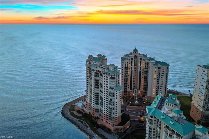 Perched above the shimmering shoreline at the southern tip of Marco Island, this extraordinary Penthouse at Belize in Cape Marco is a rare coastal masterpiece where breathtaking panoramas, magazine-worthy renovation, and ultra-luxury resort living converge in spectacular fashion. From the moment the elevator opens into your private foyer, sweeping Gulf, beach, and island views pour in, setting an unforgettable tone for a residence designed to awe at every turn. Italian porcelain floors flow through a brilliantly reimagined interior that blends warm coastal elegance with sophisticated style, beginning in the welcoming grand salon, where walls of glass frame dolphins at play, boats drifting across turquoise waters and vibrant sunsets painting the sky each evening. The chef’s kitchen impresses with abundant white cabinetry, sunlit counter space, an expansive island, and seamless connection to casual and formal living areas. A newer stainless steel GE double-wall oven enhances the exceptional culinary experience, complementing the home’s refined coastal design. The adjacent Gulf-front den with a fireplace creates an intimate waterside retreat for morning coffee or quiet evenings. A separate media room, also with a fireplace and dramatic picture windows, adds another inspired living space, while the beautifully appointed office with a wet bar, wine cooler, and lanai access balances productivity and relaxation. The primary suite is a sanctuary of serenity, where a full wall of glass opens to endless horizon views, complemented by dual walk-in closets including a cedar-lined closet, a private sauna, and a spa-caliber bath with soaking tub, frameless glass shower, dual water closets and a bidet. Equally impressive guest accommodations include a grand en-suite bedroom with its own open-air lanai overlooking the entire island, a two-room suite with sitting room and wine cooler, and a visionary bunk room with eight full-size beds, ideal for gatherings that create lifelong memories. Thoughtful details continue with a spacious laundry room and direct access to the discreet service corridor connecting to the trash chute, utilities, service elevator and stairs. Offered fully furnished, you have the opportunity to enjoy your new penthouse immediately. Outside, the premier amenities offered to Belize residents elevate the lifestyle even further-swim in the waterside pool, unwind in the hot tub, grill in the covered outdoor kitchen, work out in the Gulf-front fitness center, watch movies in the theatre or play billiards, or play tennis and pickleball at Cape Marco before strolling to Marco Island’s famed crescent beach via the private direct beach access. Guest suites and EV charging also available. Two prime garage spaces near the elevator and convenient bike storage complete this remarkable offering. Steps from dining and boutiques, this penthouse delivers a refined coastal lifestyle with remarkable value.