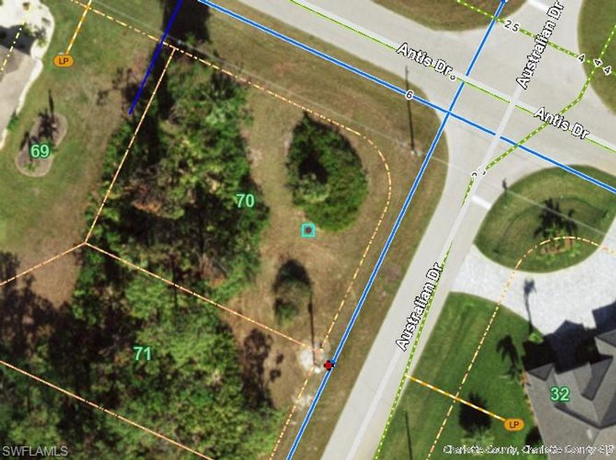 Located in the desirable community of Rotonda West, this spacious lot at 255 Australian Drive offers an excellent opportunity to build your dream home. With easy access to local amenities, golf courses, and the stunning beaches of the Gulf Coast, this property is perfect for those seeking a peaceful yet vibrant lifestyle. Surrounded by mature trees and natural beauty, the lot provides plenty of space for your ideal home and outdoor living. Whether you're planning a custom build or looking for an investment opportunity, this lot offers great potential. Don’t miss the chance to own this prime piece of land in a highly sought-after neighborhood!