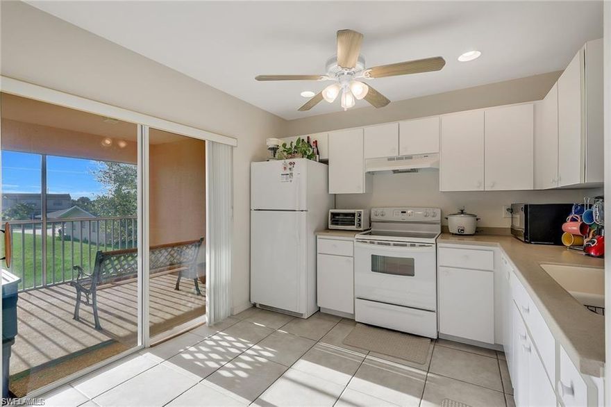 PICTURE PERFECT!! ~ Impeccably maintained 2nd floor condo with screened in lanai and beautiful sunset views! This 2/2 with a carport has tile in the main areas, carpet in the bedrooms, an open floor-plan concept and tons of natural lighting through the kitchen area. This is a great Southwest Florida vacation spot, only minutes to downtown Cape Coral, Tarpon Point Marina, Cape Harbour & The Boathouse - Yacht Club area! Has the potential to rent for a minimum of $1,000 monthly to an annual tenant and more for seasonally furnished renting. Washer & dryer are inside the home and will be staying. Well worth seeing and at this price will not last long!