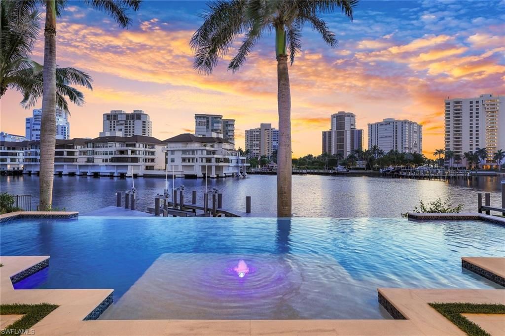 Photo of 309 Neapolitan WAY, NAPLES, FL 34103 (MLS # 225061003)