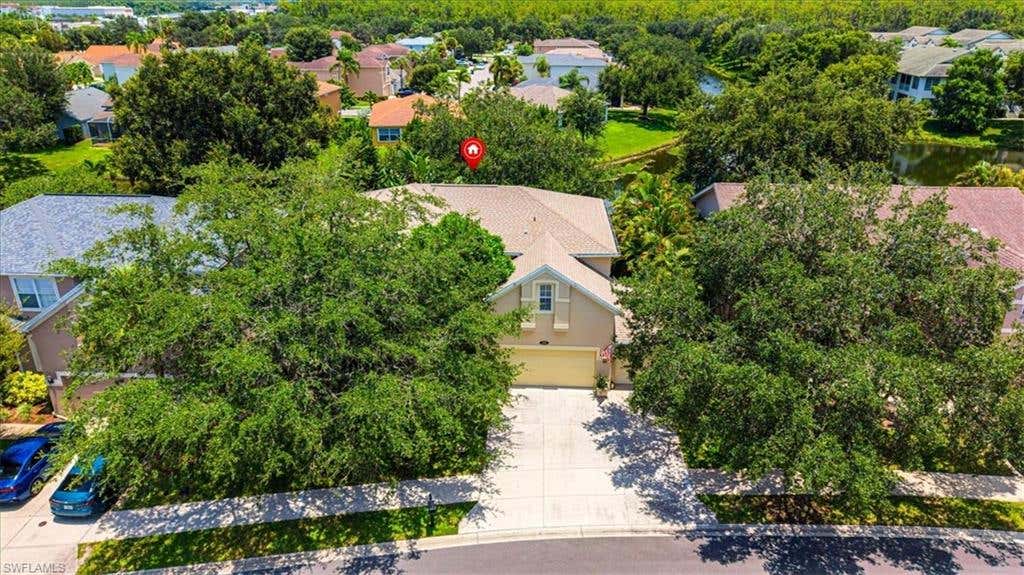 Photo of 120 Burnt Pine DR, NAPLES, FL 34119 (MLS # 226028007)