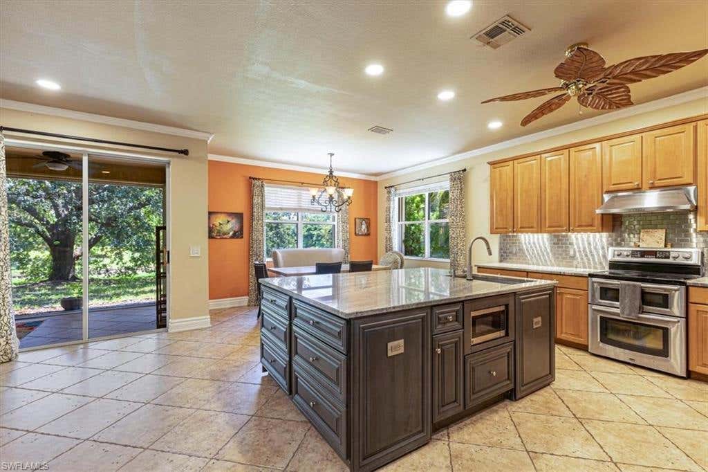 Photo of 120 Burnt Pine DR, NAPLES, FL 34119 (MLS # 226028007)