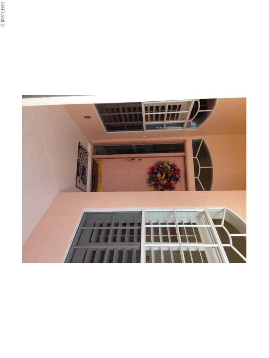 ALERT!!! FRESHLY PAINTED INSIDE AND ALL NEW TOP-OF-THE-LINE STAINLESS APPLIANCES!!! Every detail has been attended to in this Furnished Home. The striking difference between this villa and the others is the view. This has a wide angle view of the fairway, the lake, and the heated pool. Go look at the others and compare yourself. Upgrades like the extra wide door casements with trim on the top, the baseboards over 5 inches high, the extra wide wood plantation shutters, and the Baldwin Brass touches in many rooms really catch your eye. Both bathrooms have the ceilings treated and there is a lot of crown moulding. The den also has a plaid ceiling. The wall between the kitchen and living room is extended so that furniture can be better placed. The tile floors were upgraded and laid diagonally. Clear glass windows are used in the baths and door entry. Even the laundry room is decorated. There is an 18 X 35 foot oval pool that overlooks the fairway. Stainless steel screws were anchored into the supports. The outside and the garage have been power washed recently. There is a newer pool heater. Sunsets are spectacular here! AVAILABLE FOR IMMEDIATE OCCUPANCY