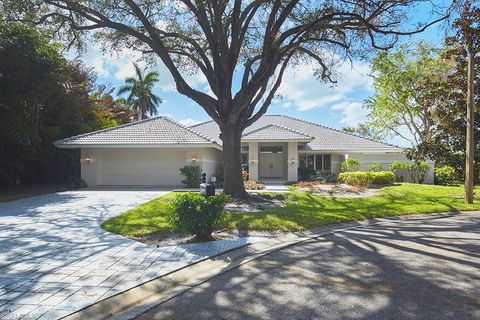 Photo of 702 Hollybriar LN, NAPLES, FL 34108 (MLS # 224082009)