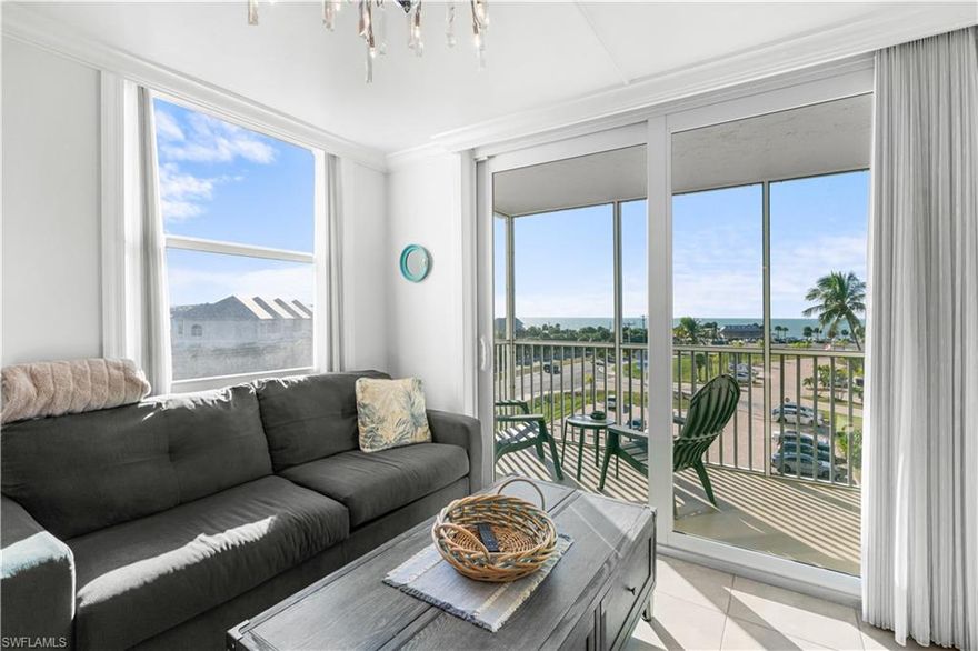 This beautifully updated fifth-floor unit at Bonita Beach & Tennis Club offers direct Gulf views and a true beachfront setting. Enjoy sweeping ocean vistas, refreshing coastal breezes, and unforgettable sunsets from your private balcony, all just steps from the sand. The unit is fully equipped for a comfortable stay with a complete kitchen, inviting living space, Wi-Fi, and beach essentials. Perfectly located near popular restaurants, local shops, and waterfront attractions, with downtown Bonita Springs only 10 minutes away and the airport just 20 minutes from your door. A relaxed coastal escape in an unbeatable beachfront location.