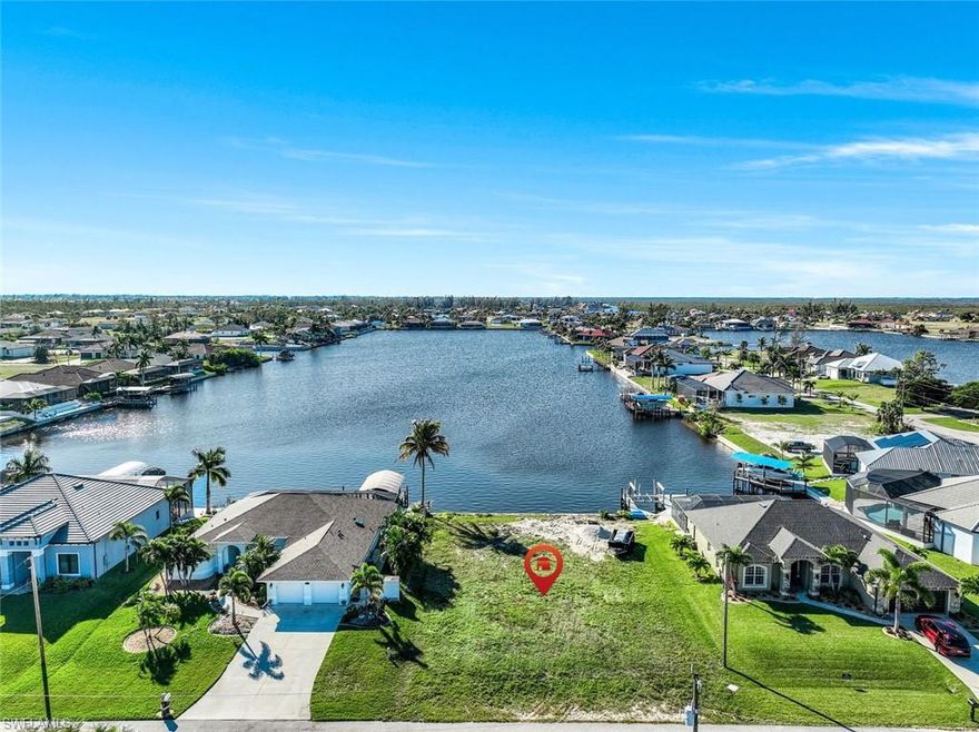 Welcome to your dream waterfront property in NW Cape Coral! This gorgeous Gulf access lot is situated on the serene Lupine Lake, offering an 85-foot waterfront that is ready to welcome your dream home. Take advantage of the stunning lake view that unfolds right before your eyes. Imagine waking up to the tranquil beauty of Lupine Lake every day, with its peaceful waters reflecting the vibrant colors of the sunrise and sunset. This is not just a property; it's an invitation to a lifestyle of relaxation and natural splendor. The lot comes complete with a seawall in place, ensuring stability and ease in constructing your dream home. Gulf access adds another layer of appeal, allowing you to explore the waterways and access the Gulf of Mexico right from your backyard.Whether you're an avid boater, a nature lover, or someone seeking a peaceful retreat, this Gulf access lake lot is the canvas for your ideal living space. Don't miss the opportunity to turn your dreams into reality – seize this chance to create your own haven in one of the most desirable locations in NW Cape Coral.